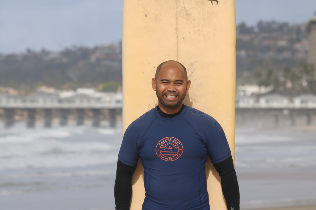 Man in the surfing lesson